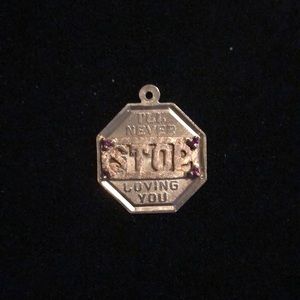 VINTAGE 14KT GOLD AND RUBY PENDANT/CHARM